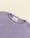 hvid-baby-pullunder-harvey-aus-merinowolle-lilac